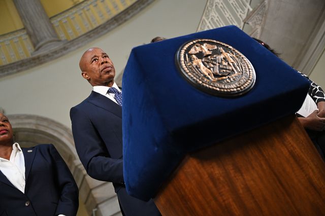 Mayor Eric Adams standing at a podium at a press conference at City Hall in response to the United States Supreme Court's ruling striking down New York State's concealed carry restriction on June 23, 2022